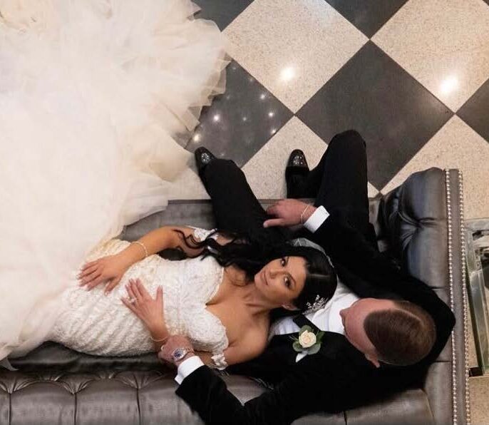 Bride and groom relaxing in The Addison-Park lobby